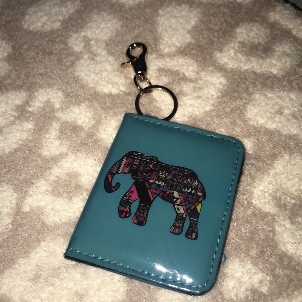 Green keychain card case w/ elephant detail
